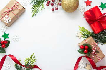 Christmas backgrond with gift boxes, red ribbon, winter decorations, isolated on white background. Christmas and New year concept. Mock up, copy space. Flat lay, top view.