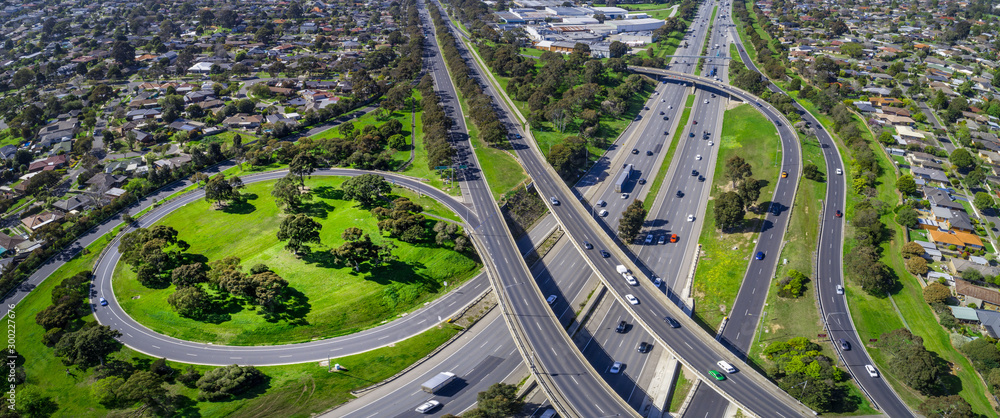 Monash freeway and Wellington road interchange in Mulgrave suburb - aerial panoramic landscape - obrazy, fototapety, plakaty 