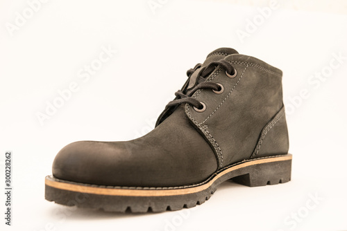 vintage black boots on white background, retro shoes