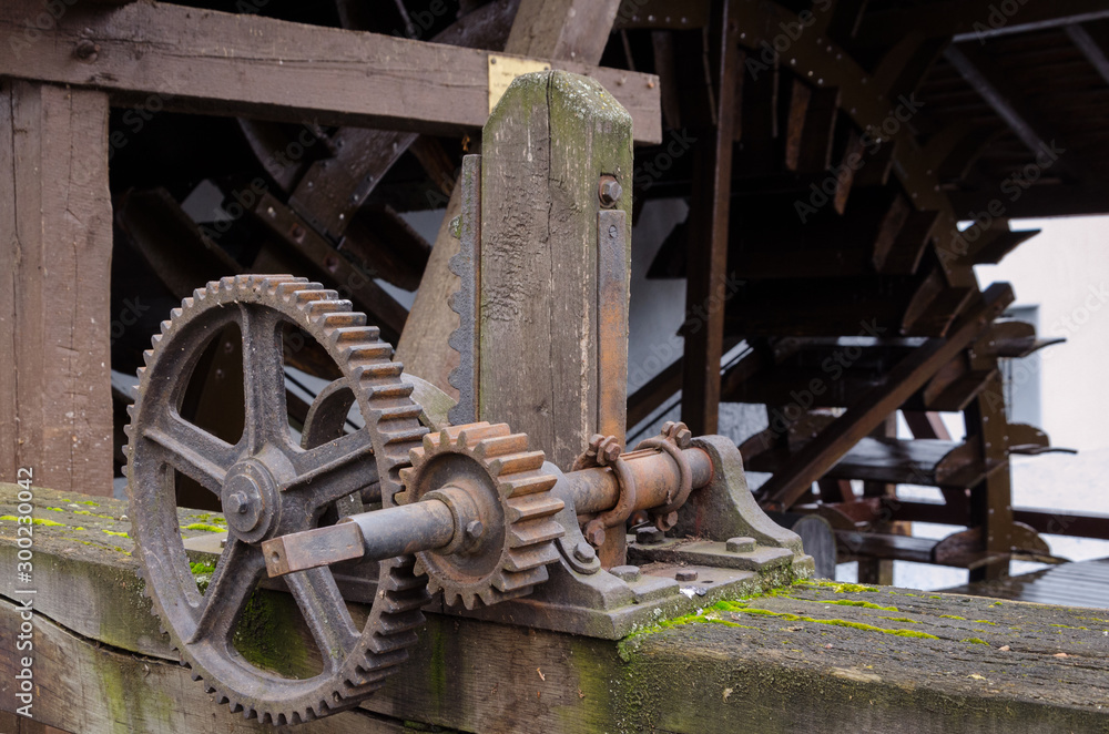 Rusted gears of an old water mill