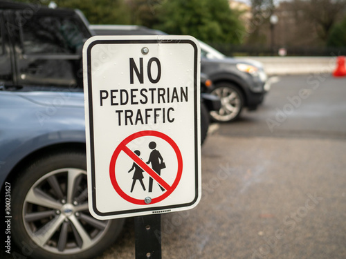 No pedestrian traffic street sign with man and woman crossed out symbol