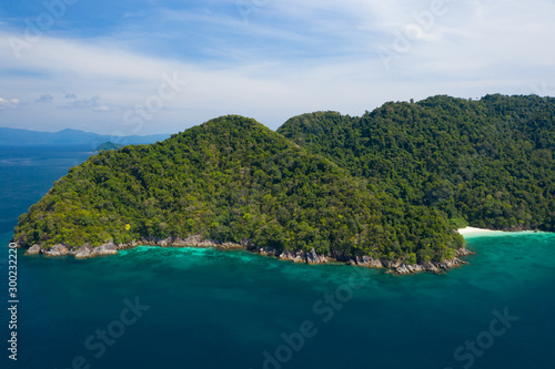 Aerial view from a drone of beautiful Nyaung Oo Phee island on sunny day in Myanmar.