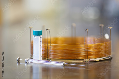 Syringe, vial, and GC capillary column used for separating volatile molecules.