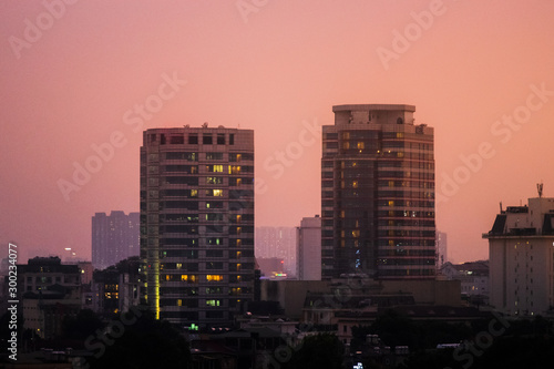 Hanoi city Skyline and cityscape captured during a beautiful Vietnamese sunset in October of 2019 from a skybar.