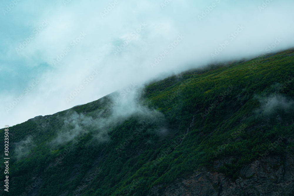 arctic hill/fell/fjeld/mountain in finnish lapland, morning fog
