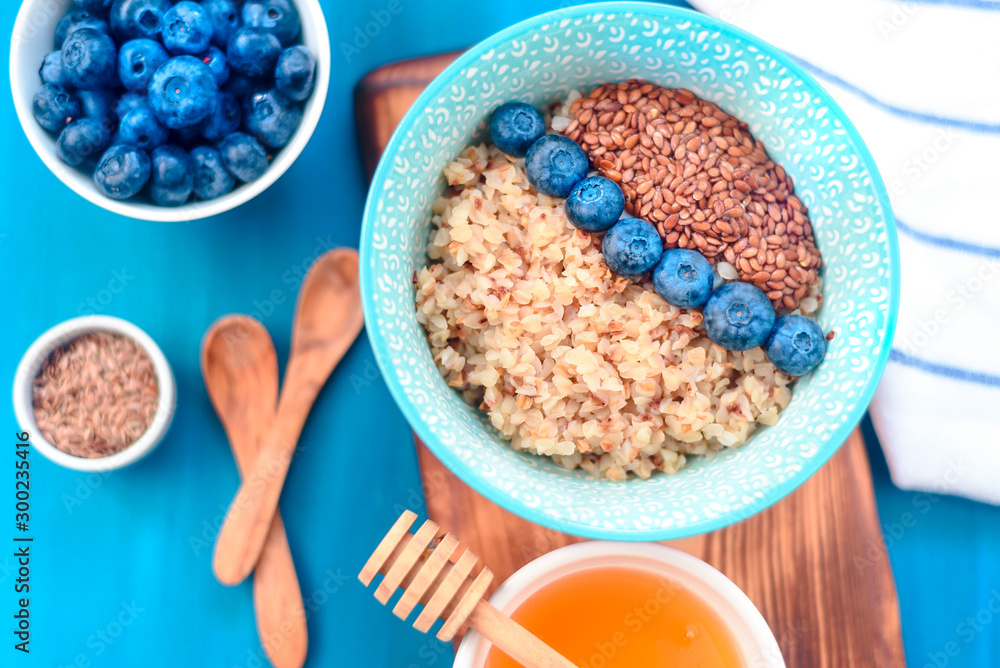 buckwheat porridge with fruits, the concept of a healthy breakfast, diet, veganism, vitamins buckwheat porridge with fruits, the concept of a healthy breakfast, diet, veganism, vitamins