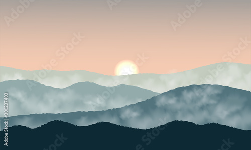 Sunrise and fog in the mountains. Green mountaion on orange sky .