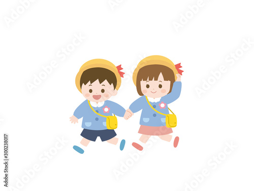 手を繋いで歩く園児