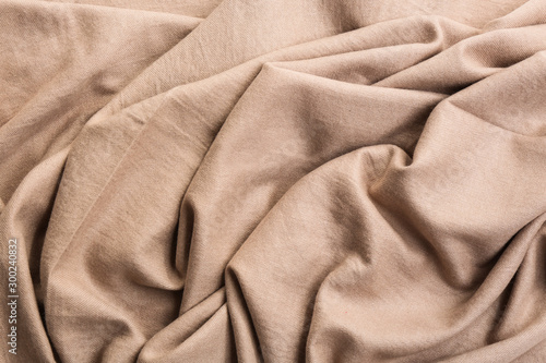 Light brown cloth as background, closeup view