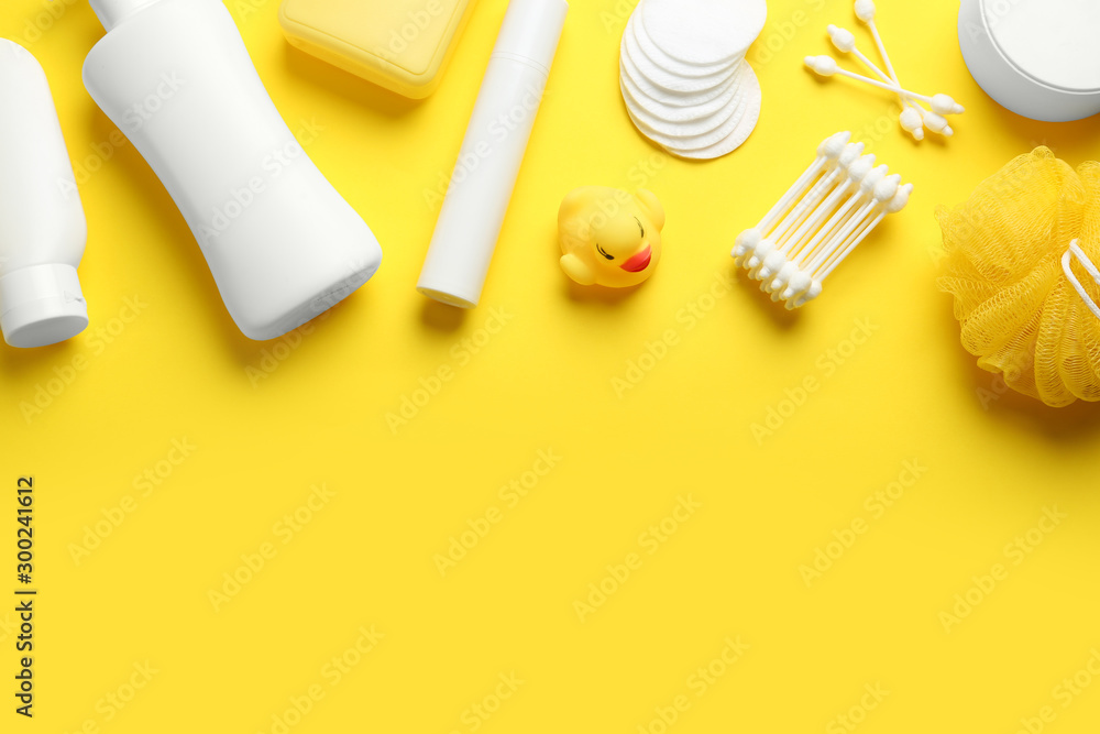 Flat lay composition with baby cosmetic products on yellow background. Space for text - obrazy, fototapety, plakaty 