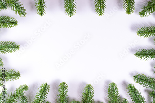 Christmas background with fir branches with copy space.