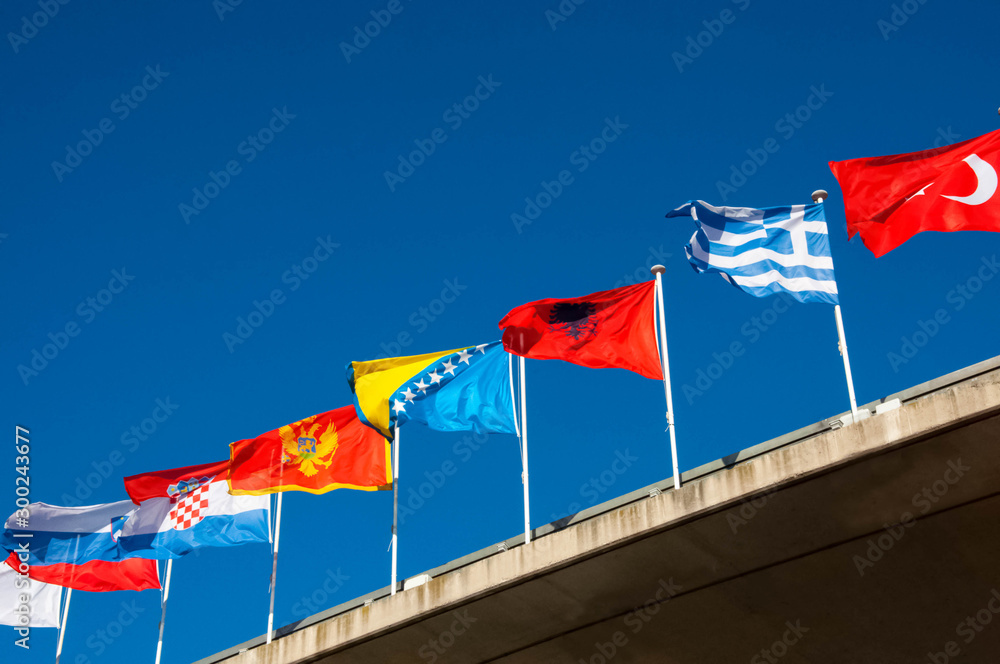 Fototapeta premium Different flags moving on the wind