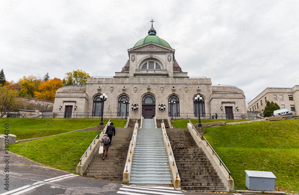 Saint Joseph's Oratory of Mount Royal (Montreal, Quebec, Canada). Roman Catholic basilica and national shrine on Westmount Summit. View from the stairs in front of the beautiful building. Pilgrimage.