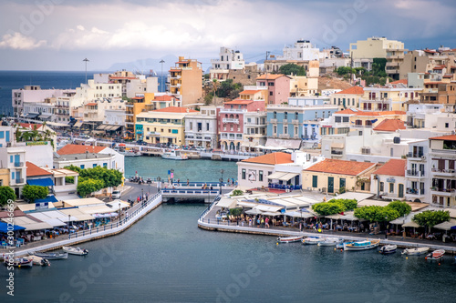 Aerial view to Agios Nikolaos, town on Crete island in Greece. © Alexey Oblov