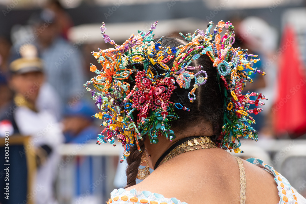 Traditional colorful Panamanian hair/head decoration (accessories) of  unidentifiable woman during Panama National Day parade celebrating the  separation of Panama from Colombia. Selective focus. Stock-Foto | Adobe  Stock