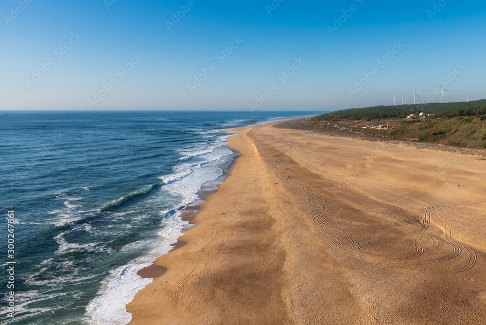 Long sandy beach at Praia do Norte, Portugal