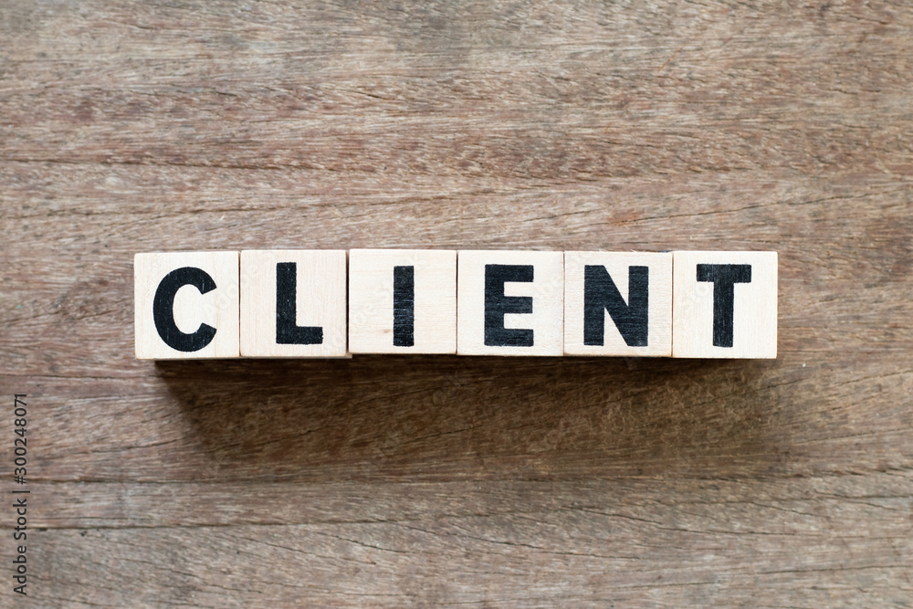 Fototapeta premium Letter block in word client on wood background