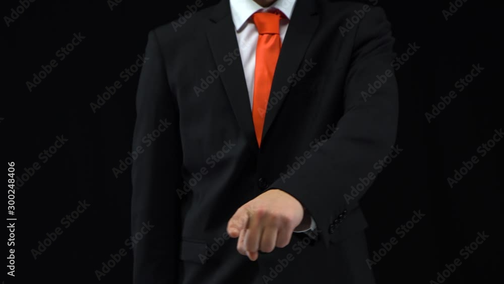 Man drawing his finger in front of himself, showing increasing. Mockup ready for your text or product. Man drawing his finger in front of himself, showing increasing. Mockup ready for your text or product.