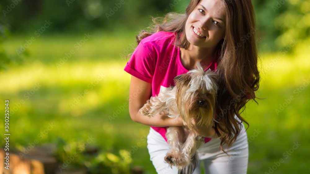 Beautiful woman play with dog in the park. Beautiful woman play with dog in the park.