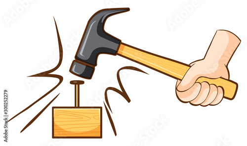 Hammer hitting nail on wooden block