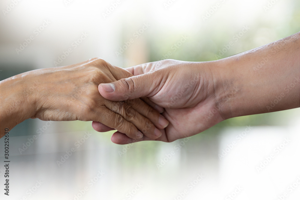 people old woman and young hand holding Disabled walking with assistance people old woman and young hand holding Disabled walking with assistance