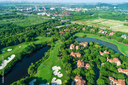 Aerial view of a beautiful green golf course.high angle view. © ABCDstock