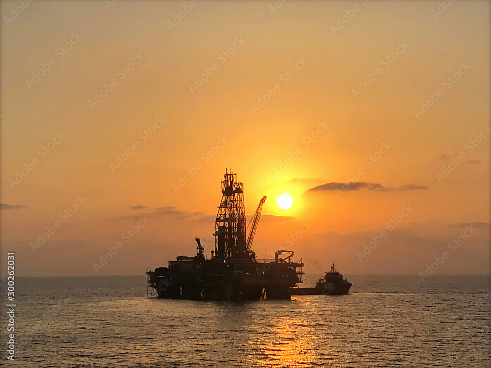 Offshore Exploration Drilling Gas Field in sunset