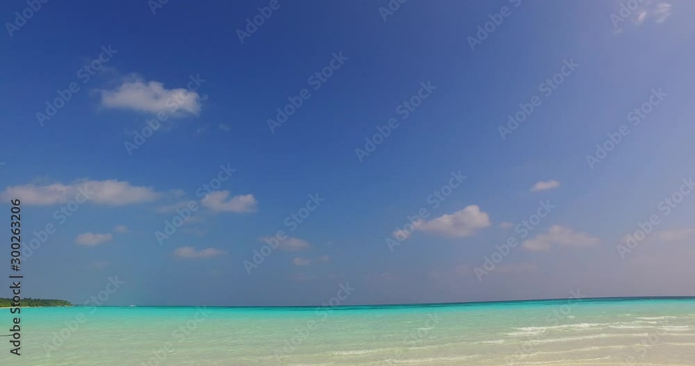 Paradise on earth seen on a fabulous seascape in Antigua, violet blue big sky over thin turquoise line of lagoon Paradise on earth seen on a fabulous seascape in Antigua, violet blue big sky over thin turquoise line of lagoon