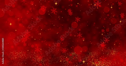 Red confetti, snowflakes and bokeh lights on the red Christmas background.