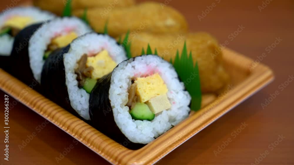 sweet egg sushi roll with fried tofu sweet egg sushi roll with fried tofu