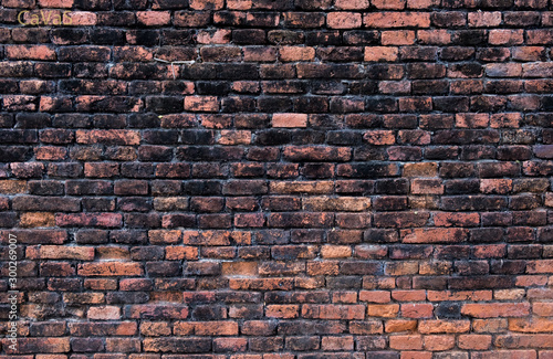 Red brick cement pattern architecture wall background.The exterior texture design concrete construction art frame.