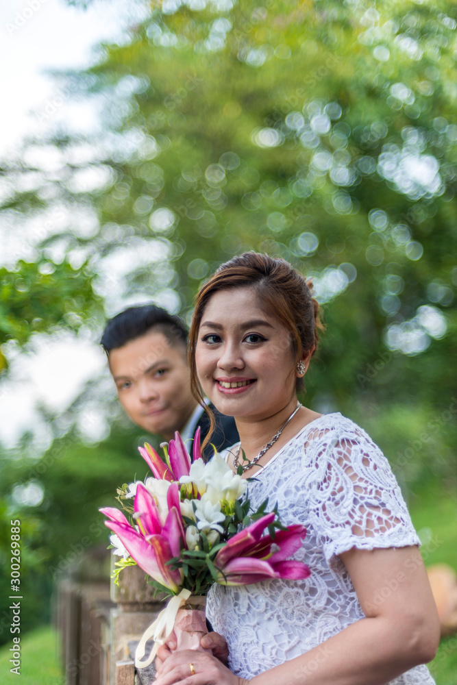 Asian loving couple pre-wedding outdoor photo shoot. Casual natural real people portraits. Loving romantic couple. Asian loving couple pre-wedding outdoor photo shoot. Casual natural real people portraits. Loving romantic couple.