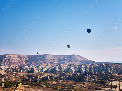 Colorful hot air balloons in the sunny autumn morning. Goreme National Park, Cappadocia, Turkey