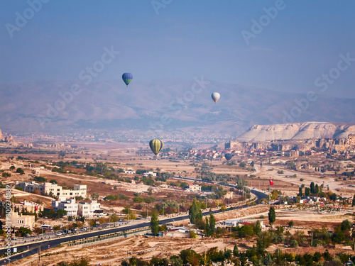 Colorful hot air balloons in the sunny autumn morning. Goreme National Park, Cappadocia, Turkey