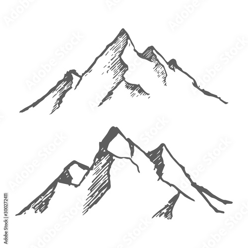 Mountains set. Hand drawn rocky peaks. Vector