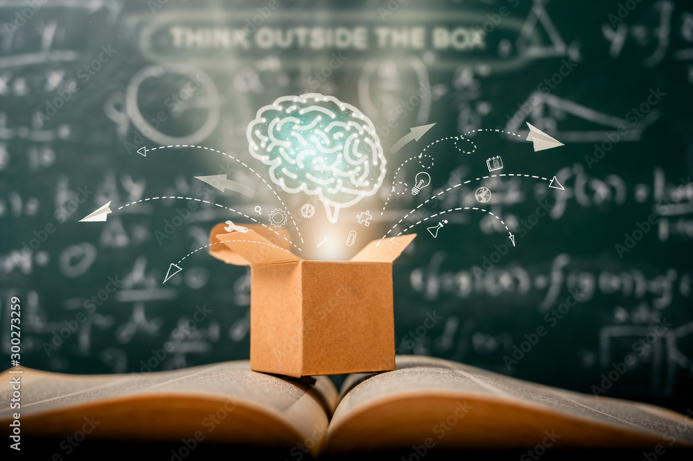 Fototapeta think outside the box on school green blackboard . startup education concept. creative idea. leadership.