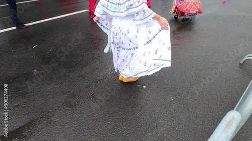 Video of unidentifiable dancer wearing traditional Panamanian white dress and dancing with it during Panama National Day parade celebrating the separation of Panama from Colombia. 4k, full hd video.