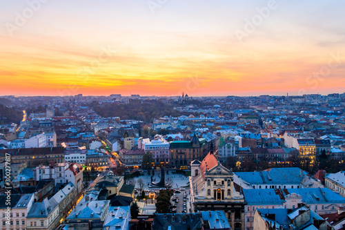 Aerial view of the old town of Lviv in Ukraine at sunset. Lvov cityscape. View from tower of Lviv town hall