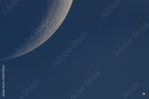 The moon and the giant gas planet Jupiter, photographed at daylight on October 31, 2019 with a maksutov telescope from Mannheim in Germany. photo