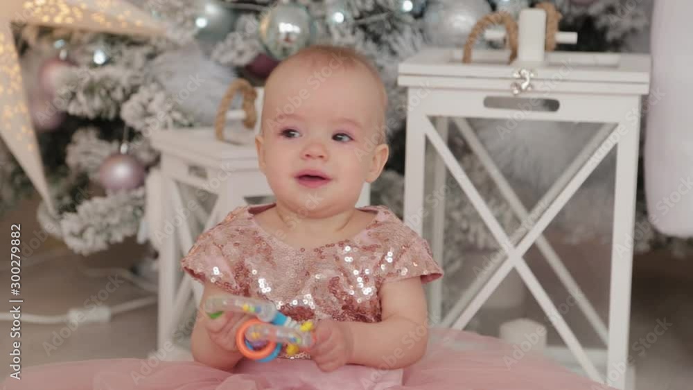 Beautiful one-year-old girl in a New Year's decor. Happy New Year 2020. Beautiful one-year-old girl in a New Year's decor. Happy New Year 2020.