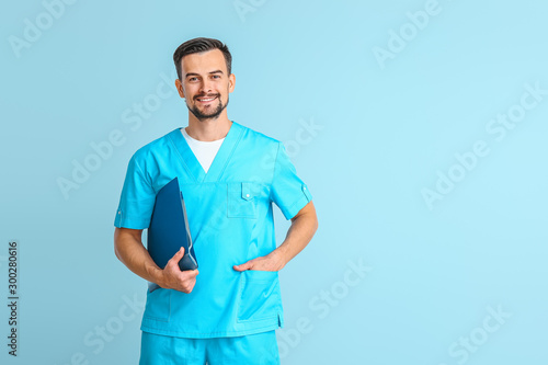 Portrait of male doctor on ...