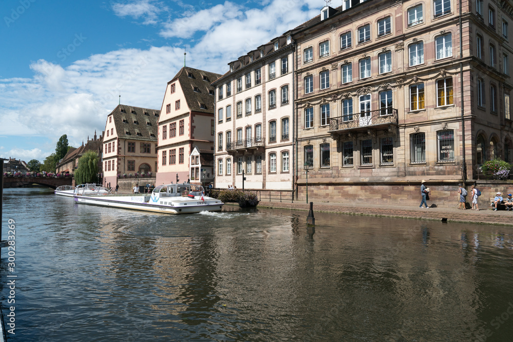 Strasbourg canals with boats ready for sightseeing cruises through the old town