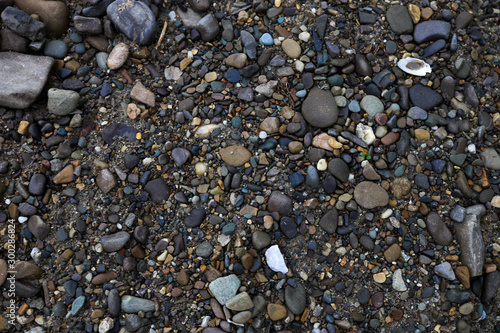 Sea pebbles on the beach. Stone texture