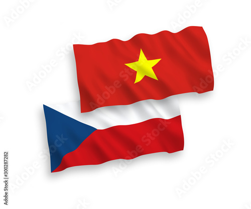 National vector fabric wave flags of Czech Republic and Vietnam isolated on white background. 1 to 2 proportion.