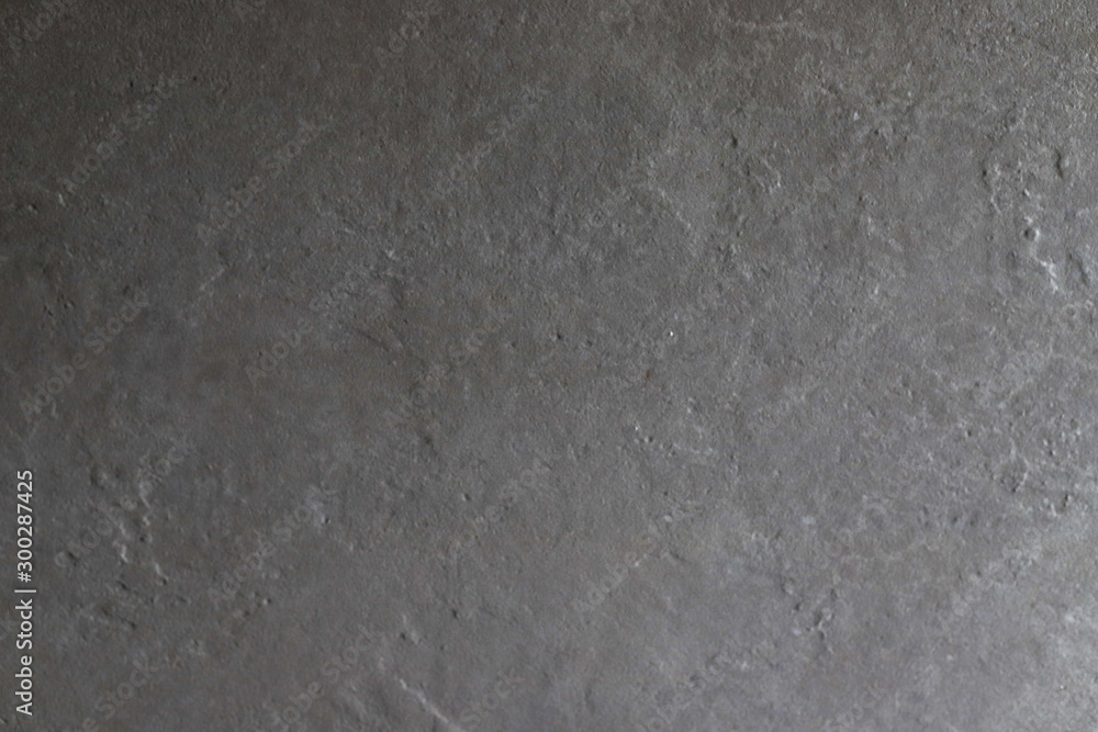 Fototapeta premium Dark grey black slate background or texture. Surface stone wall