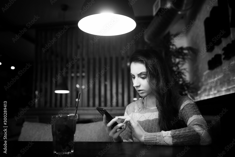 Girl in a cafe at a dinner