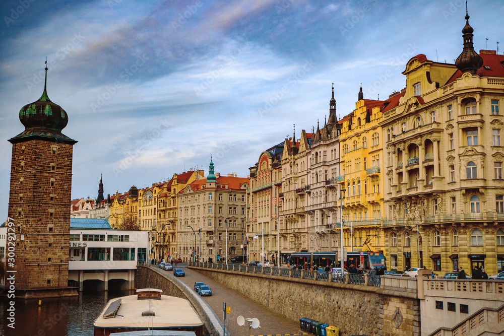 Fototapeta premium PRAGUE,CZECH REPUBLIC/ 01 November 2019: View on old houses with red roofs from Jiraskov bridge in Prague