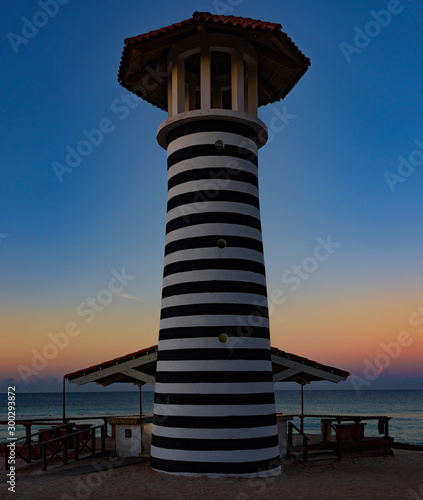 caribbean sea sunrise lighthouse