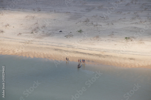 Mozambique beach, people fishing with net