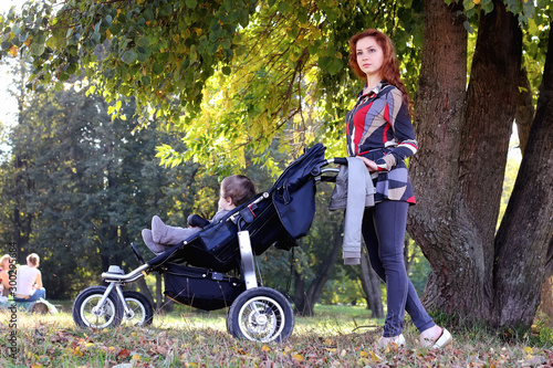 women walk stroller summer © alexkich
